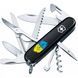 Швейцарский нож Victorinox Huntsman Ukraine 91мм 15 функций Черный Трезубец фигурный на фоне флага (1.3713.3_T1026u) V77552968 фото 1