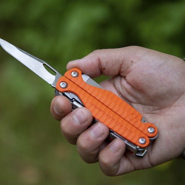 Мультитул Leatherman Charge PLUS Orange + Чохол + метричні біти + кліпса + кільце для темляка 4007845 фото